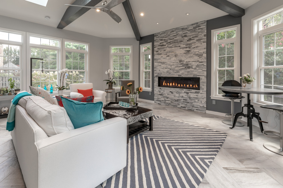Inspiration for a mid-sized contemporary sunroom in DC Metro with a ribbon fireplace and a stone fireplace surround.