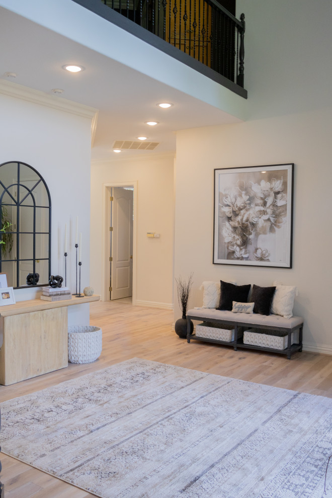 The mix of textures and the use of modern furniture and decor elements point tow