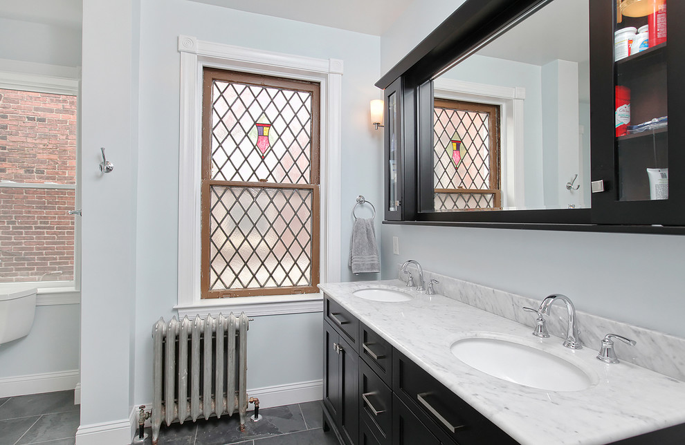 Inspiration for a traditional master bathroom in Philadelphia with white cabinets, white tile and blue walls.