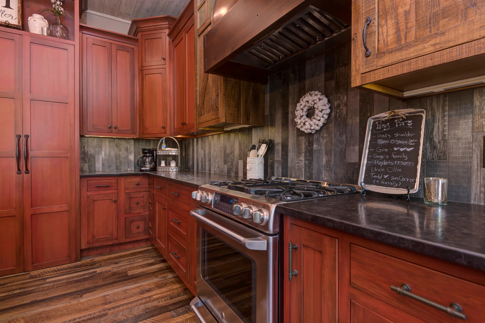 Kitchen - large rustic kitchen idea with shaker cabinets, medium tone wood cabinets and an island