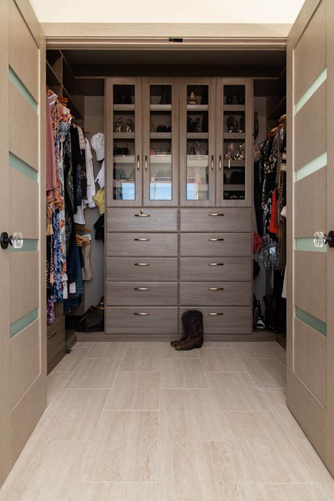 Inspiration for a beach style storage and wardrobe in Orange County.