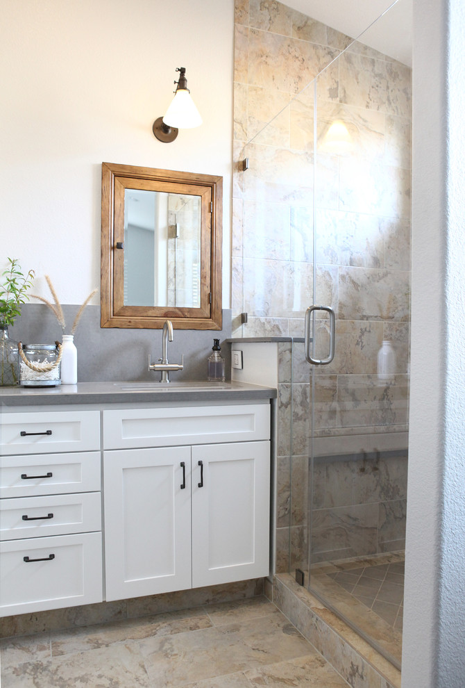 Mid-sized transitional bathroom in San Francisco with an undermount sink, shaker cabinets, white cabinets, engineered quartz benchtops, an alcove shower, a two-piece toilet, gray tile, porcelain tile, grey walls and porcelain floors.