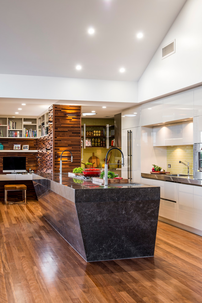 Design ideas for a contemporary open plan kitchen in Brisbane with medium hardwood floors and with island.