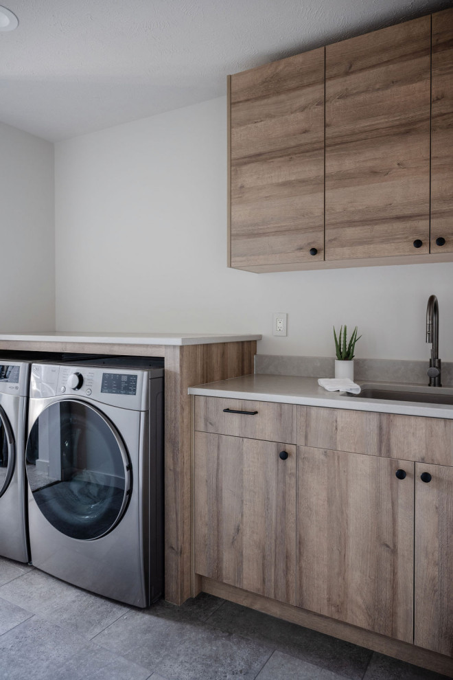 Design ideas for a contemporary laundry room in Omaha.