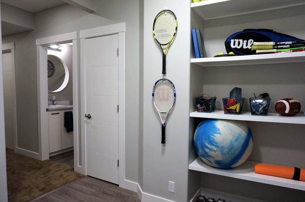 Inspiration for a transitional basement remodel in Calgary