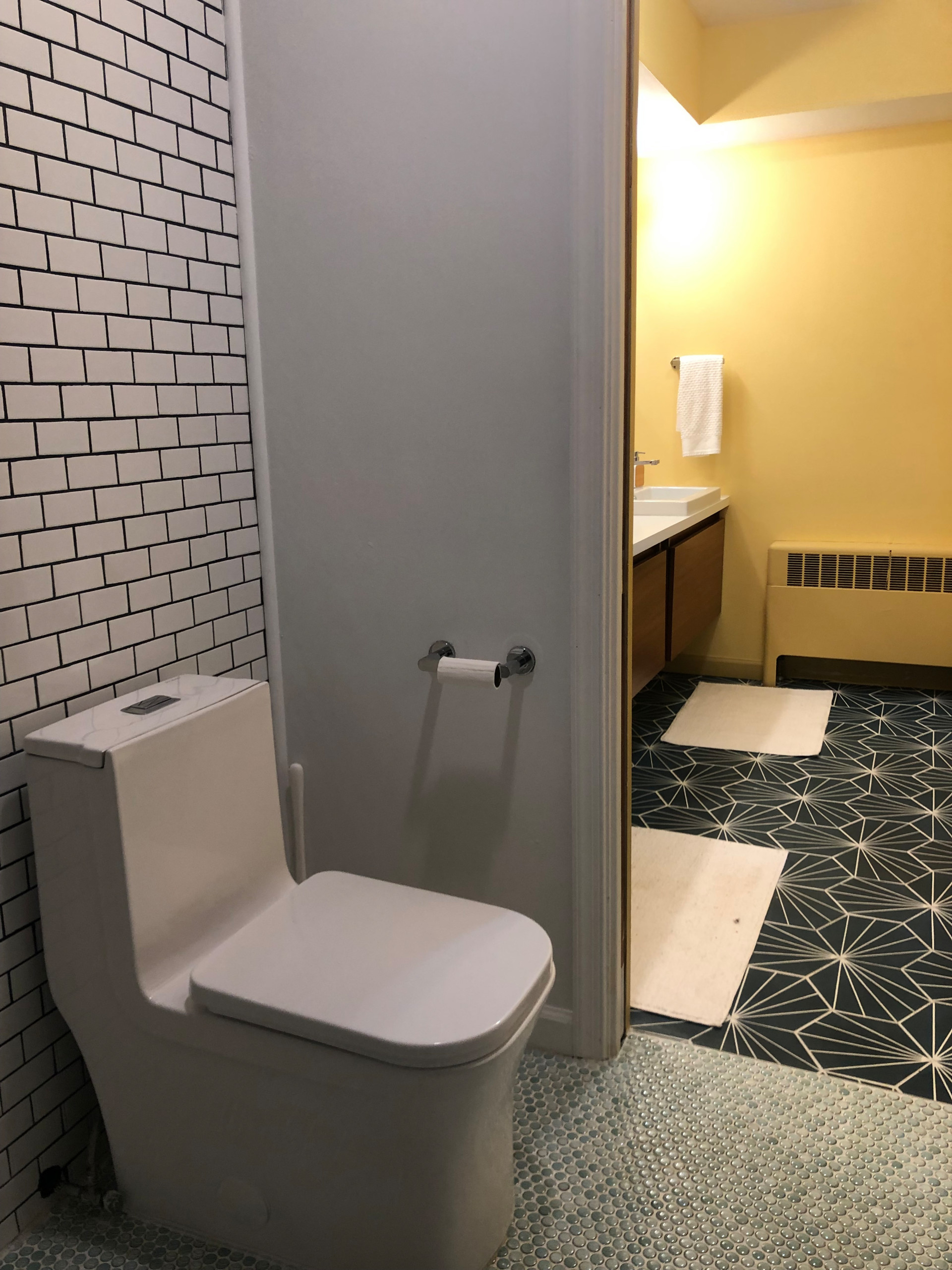 One Piece Toilet With Penny Floor Tile