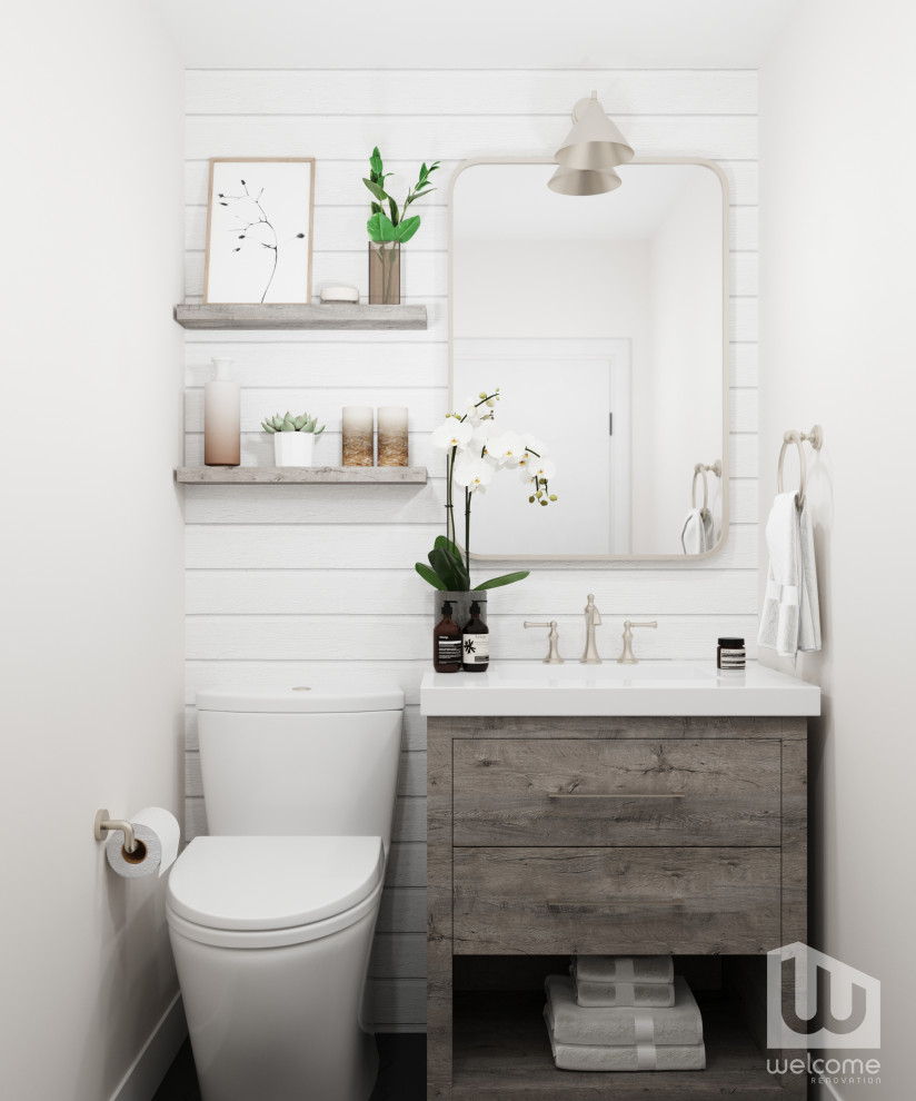 Maritim inredning av ett litet vit vitt toalett, med släta luckor, skåp i slitet trä, en toalettstol med hel cisternkåpa, vit kakel, grå väggar, ett integrerad handfat och bänkskiva i kvarts