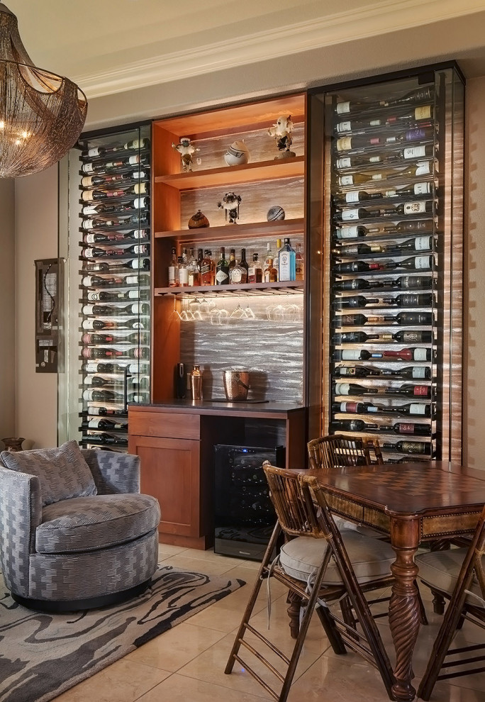 Mid-sized modern wine cellar in Phoenix with porcelain floors, storage racks and multi-coloured floor.