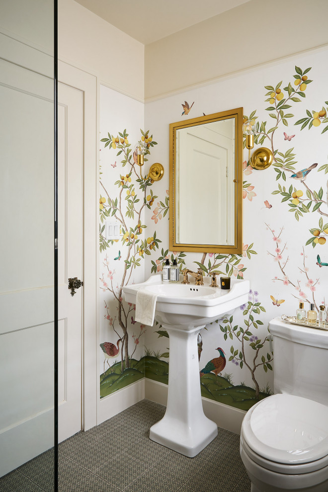 Design ideas for a mid-sized transitional master bathroom in Chicago with a curbless shower, a one-piece toilet, white tile, cement tile, white walls, ceramic floors, a pedestal sink, grey floor, an open shower, a single vanity and wallpaper.