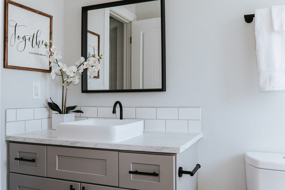 Inspiration for a country bathroom in Denver with shaker cabinets, grey cabinets, an open shower, white tile, subway tile, an integrated sink, marble benchtops, white benchtops, a single vanity and a built-in vanity.
