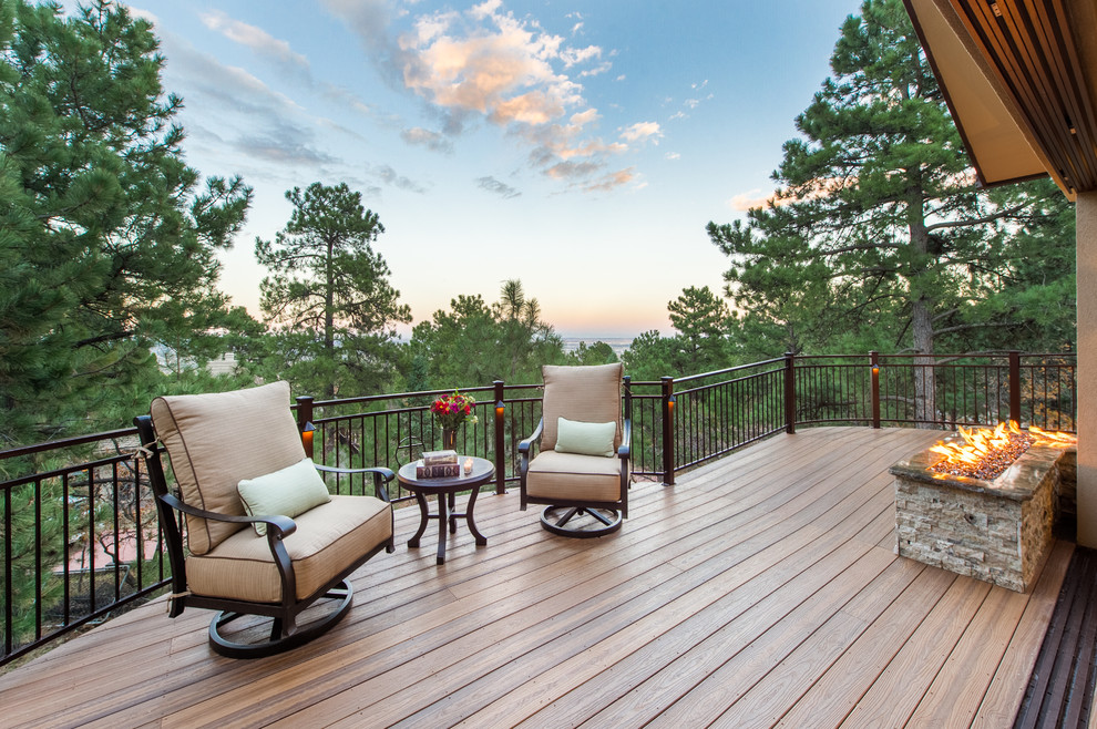 Deck - large traditional backyard second story deck idea in Other with a fire pit