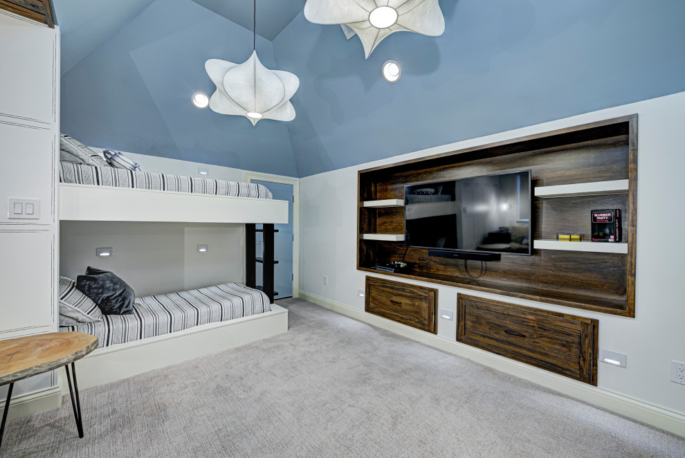 Inspiration för mellanstora moderna könsneutrala barnrum kombinerat med sovrum, med flerfärgade väggar, heltäckningsmatta och grått golv