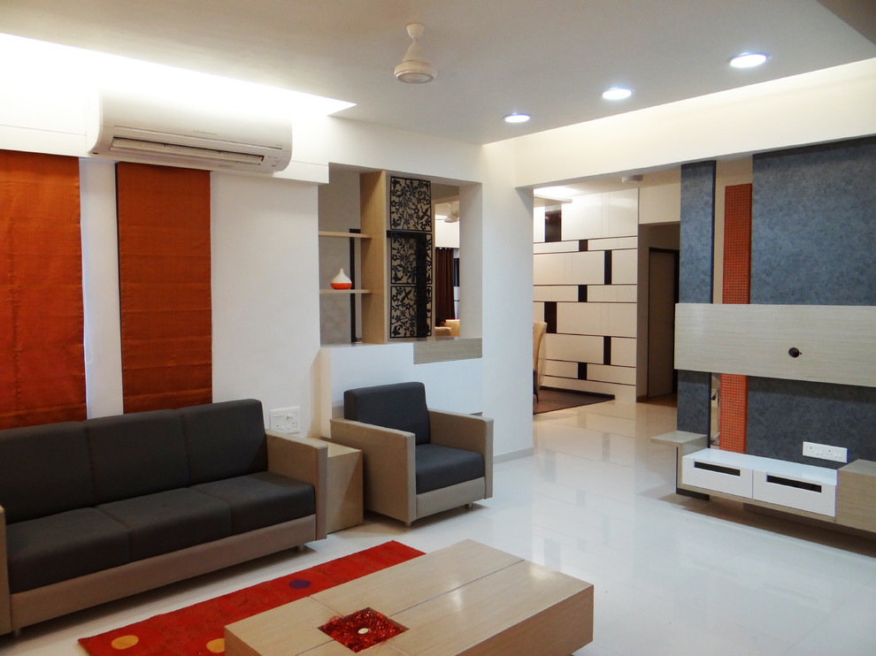 Design ideas for a contemporary living room in Ahmedabad.