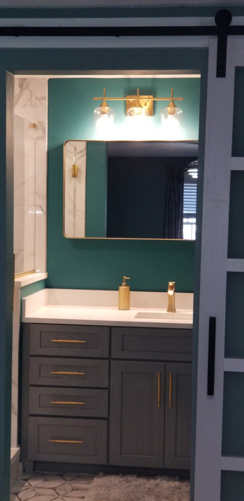 Photo of a medium sized classic ensuite bathroom in Boston with recessed-panel cabinets, blue cabinets, a walk-in shower, a submerged sink, engineered stone worktops, a hinged door, white worktops, a single sink and a built in vanity unit.