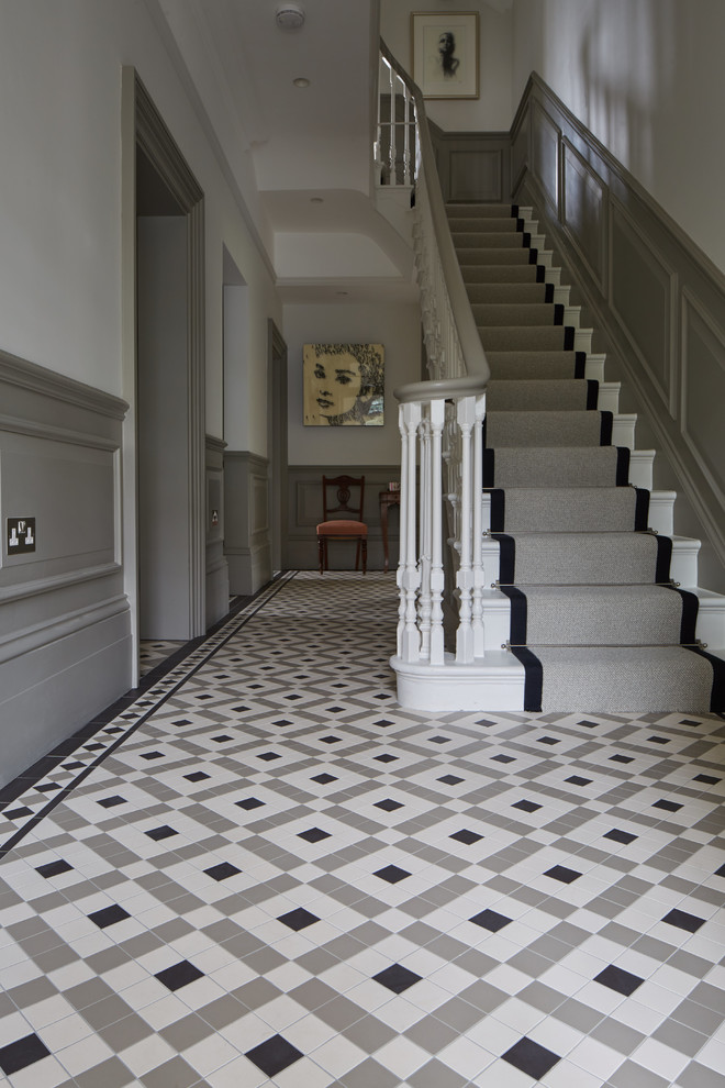 This is an example of a mid-sized traditional hallway in London.