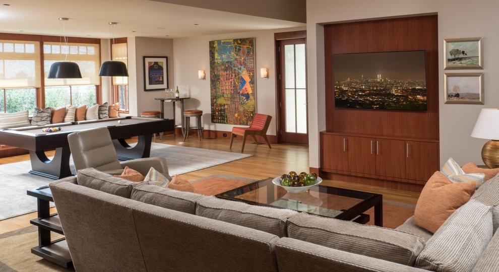 This is an example of a contemporary family room in Boston.