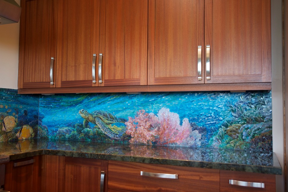 This is an example of an expansive tropical single-wall eat-in kitchen in Orange County with multi-coloured splashback, coloured appliances and with island.