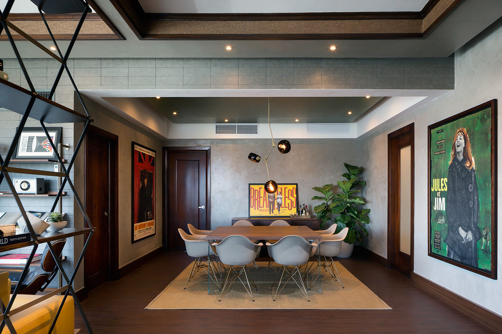 This is an example of a mid-sized midcentury dining room in Other with grey walls, laminate floors and brown floor.
