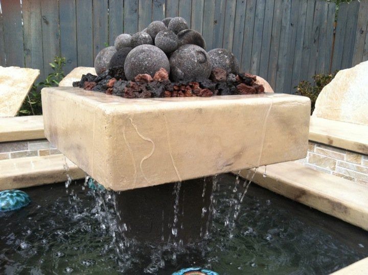 Design ideas for a small contemporary backyard patio in Boise with a water feature and no cover.