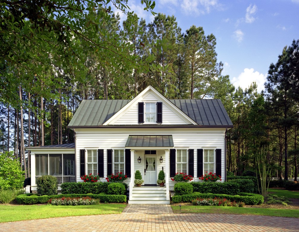Traditional white exterior in Charleston with a gable roof.
