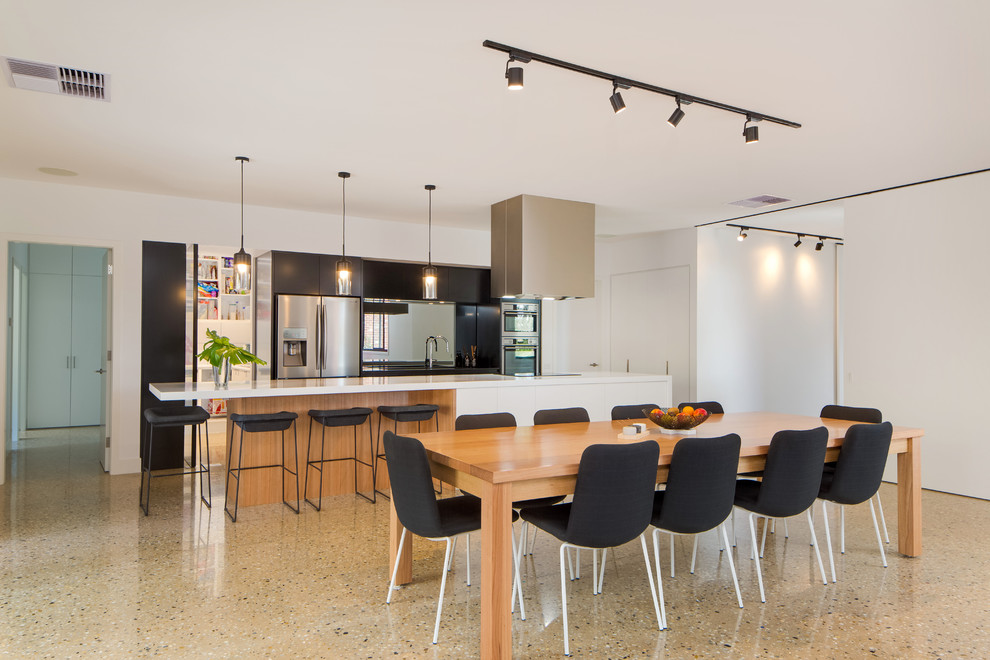 Contemporary galley eat-in kitchen in Melbourne with with island.