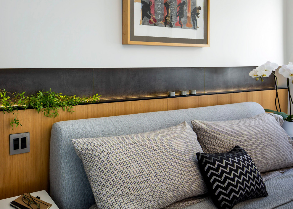 This is an example of an expansive midcentury bedroom in San Francisco.