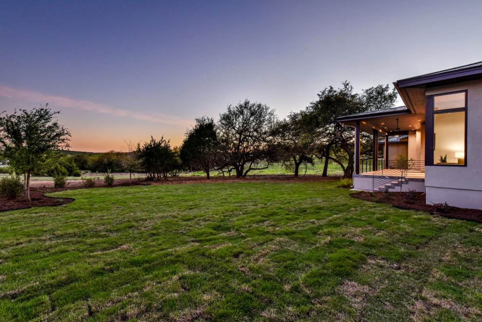 Transitional exterior home photo in Austin