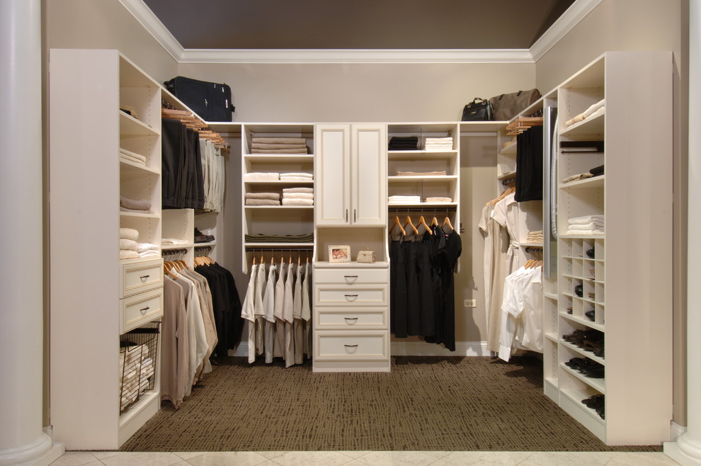 Inspiration for a mid-sized contemporary gender-neutral carpeted walk-in closet remodel in Other with open cabinets and white cabinets