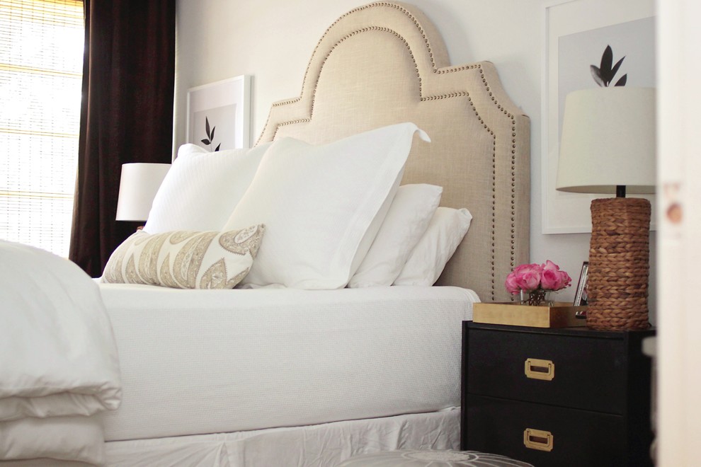 Inspiration for a small transitional master bedroom in Houston with white walls, dark hardwood floors and no fireplace.