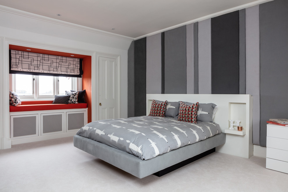 Inspiration for a transitional gender-neutral kids' room in Sussex with grey walls, carpet and grey floor.