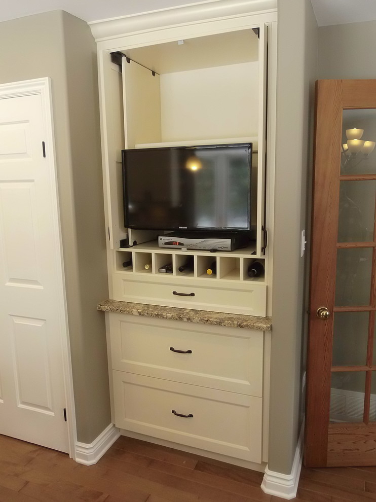 Eat-in kitchen - large transitional dark wood floor eat-in kitchen idea in Ottawa with an undermount sink, recessed-panel cabinets, beige cabinets, granite countertops, beige backsplash, terra-cotta backsplash, stainless steel appliances and an island