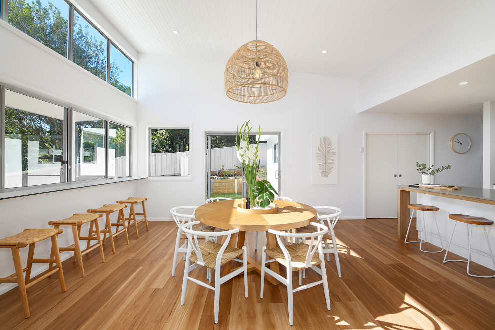 This is an example of a coastal dining room in Central Coast.