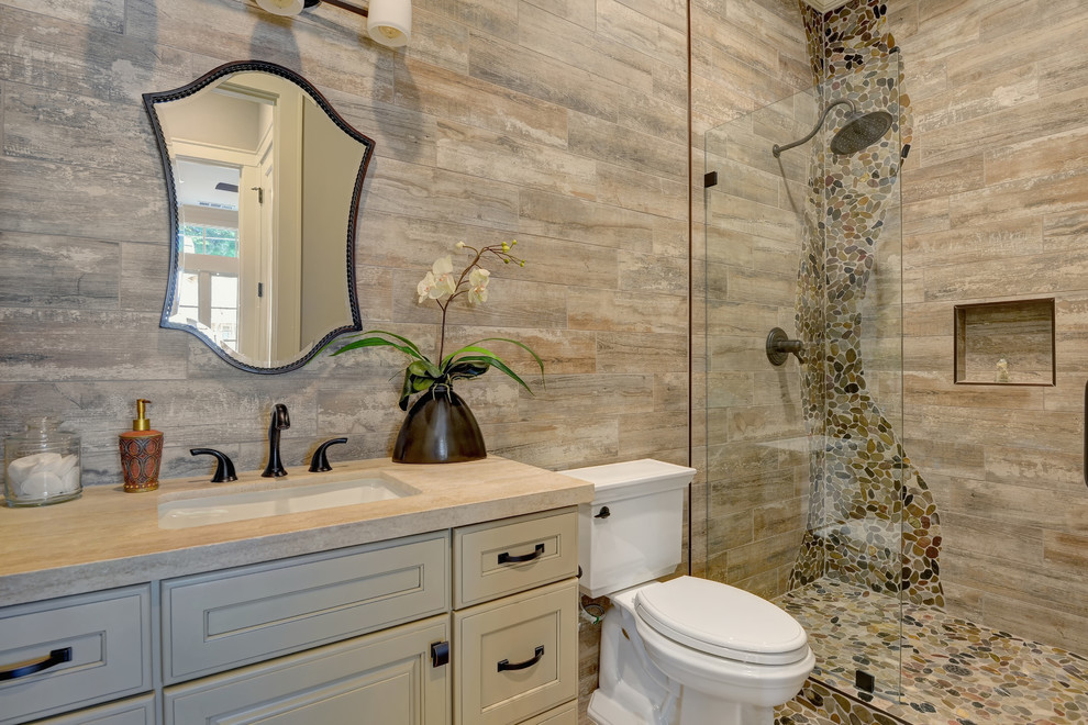 Mid-sized country bathroom in San Francisco with raised-panel cabinets, beige cabinets, an open shower, a two-piece toilet, porcelain tile, multi-coloured walls, porcelain floors, an undermount sink, multi-coloured floor and a hinged shower door.