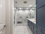 Midcentury Bathroom by Pure Builders Inc.