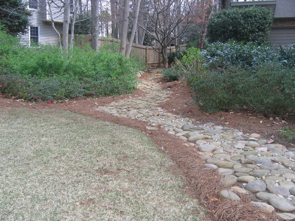 Mid-sized country backyard full sun garden in Atlanta with gravel for winter.