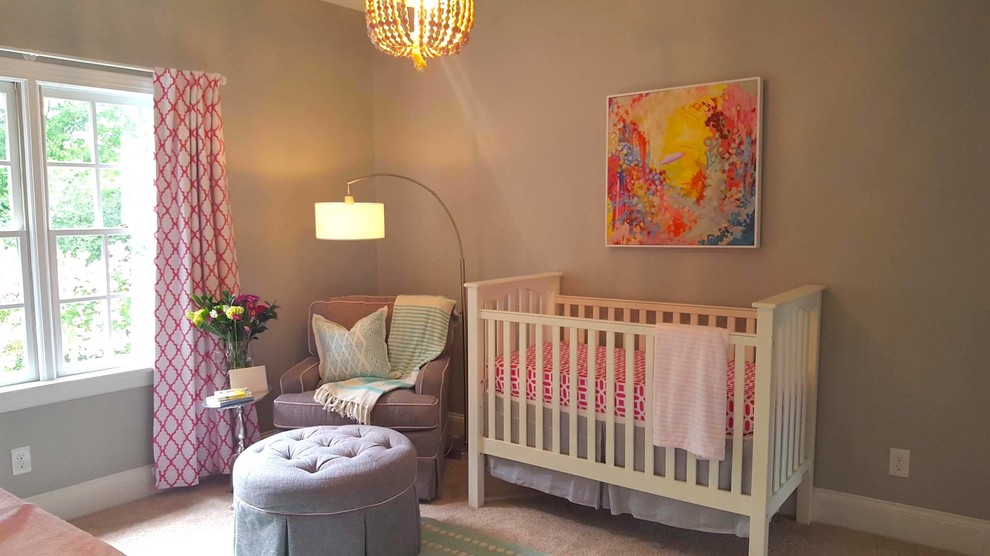 Example of a transitional nursery design in Charlotte