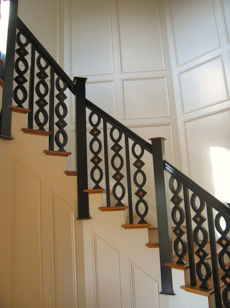 Inspiration for a large timeless wooden staircase remodel in Louisville with painted risers