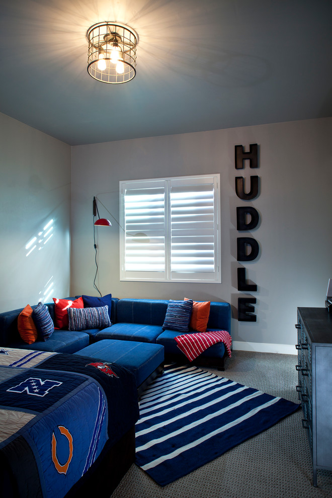Photo of a mid-sized traditional kids' room for boys in Phoenix with grey walls and carpet.