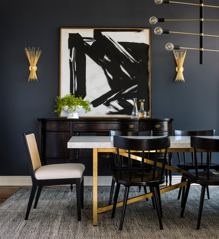 Photo of a mid-sized transitional dining room in Seattle with black walls, dark hardwood floors and brown floor.