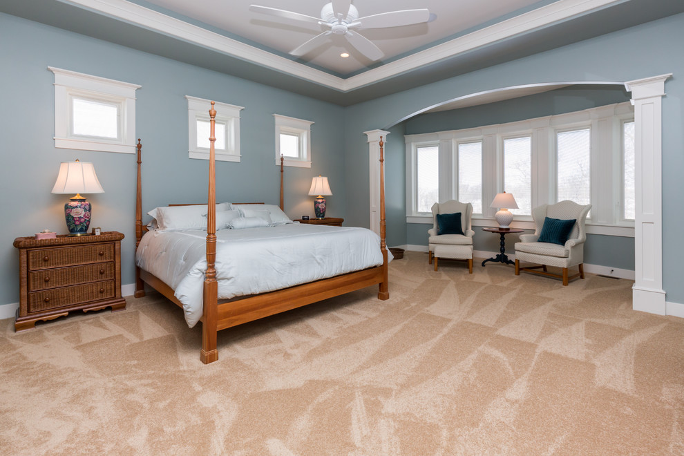 Example of a transitional master bedroom design