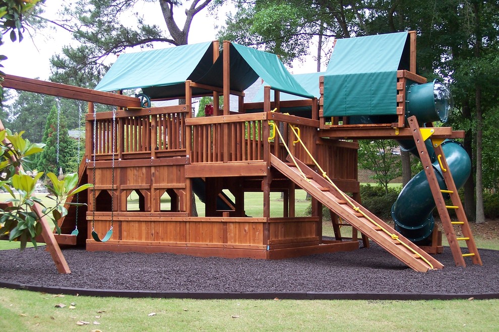 Photo of a mid-sized arts and crafts backyard full sun outdoor sport court for summer in Atlanta with with outdoor playset and mulch.