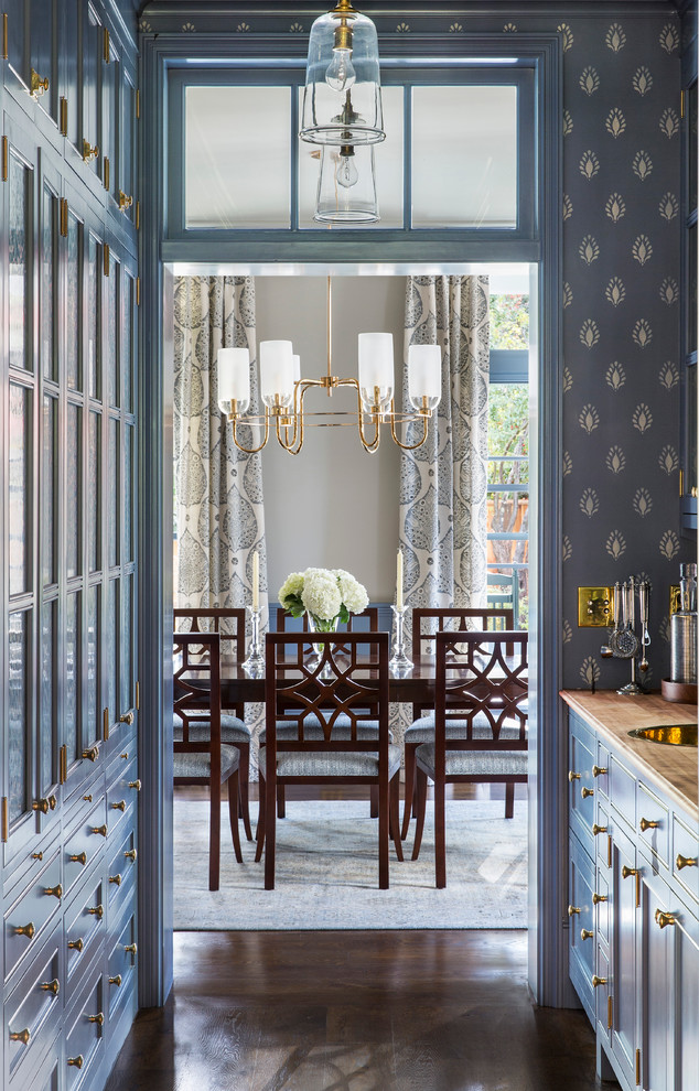 Atherton Residence - Example of a mid-sized transitional dark wood floor and brown floor enclosed dining room design in San Francisco with beige walls