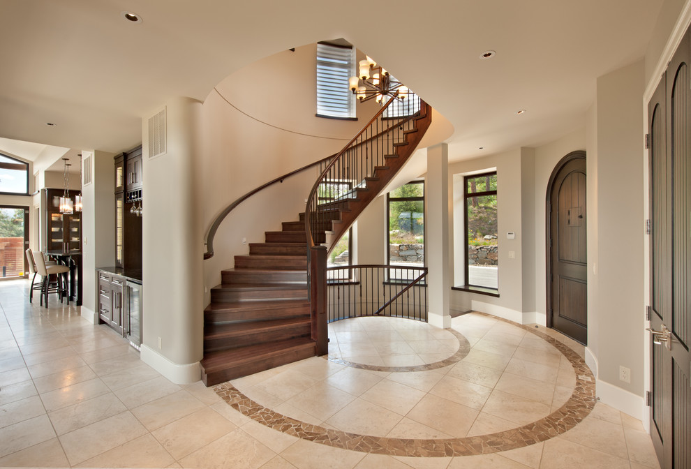 Inspiration for a transitional foyer in Vancouver with beige walls, a single front door and a dark wood front door.