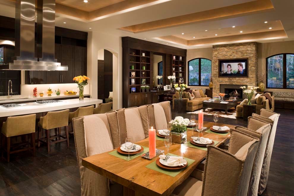 Huge transitional dark wood floor dining room photo in Denver with an undermount sink, recessed-panel cabinets, dark wood cabinets, quartzite countertops, stainless steel appliances and an island