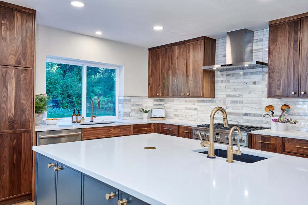 Example of a transitional kitchen design in Denver