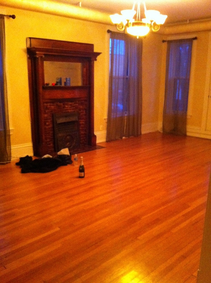 Can I use gray shades in my living room with dark brown wood?