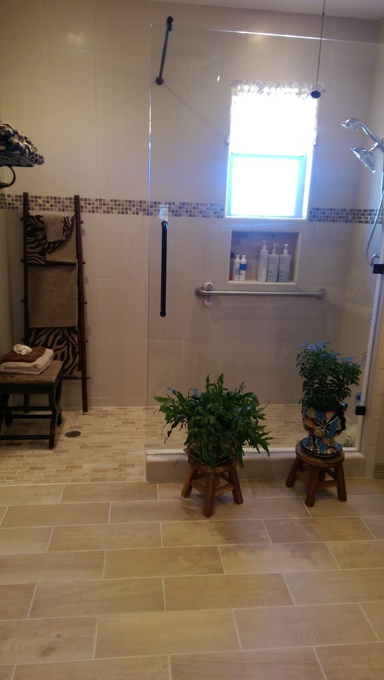 This is an example of a mid-sized traditional master bathroom in Austin with a corner shower, brown tile, multi-coloured tile, white tile, matchstick tile, white walls, vinyl floors, brown floor and an open shower.