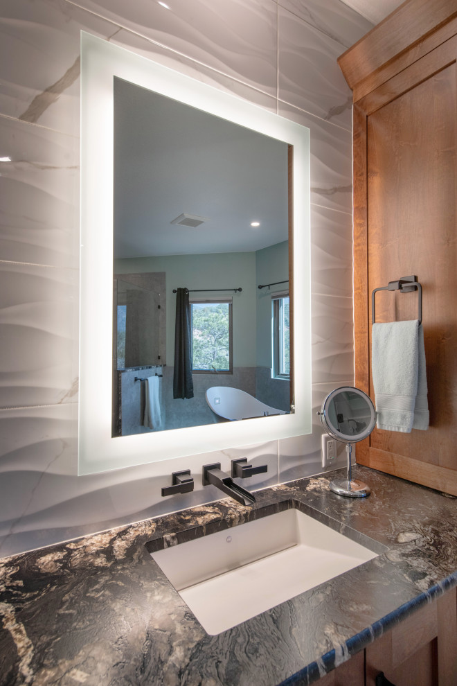 Example of a transitional bathroom design in Denver