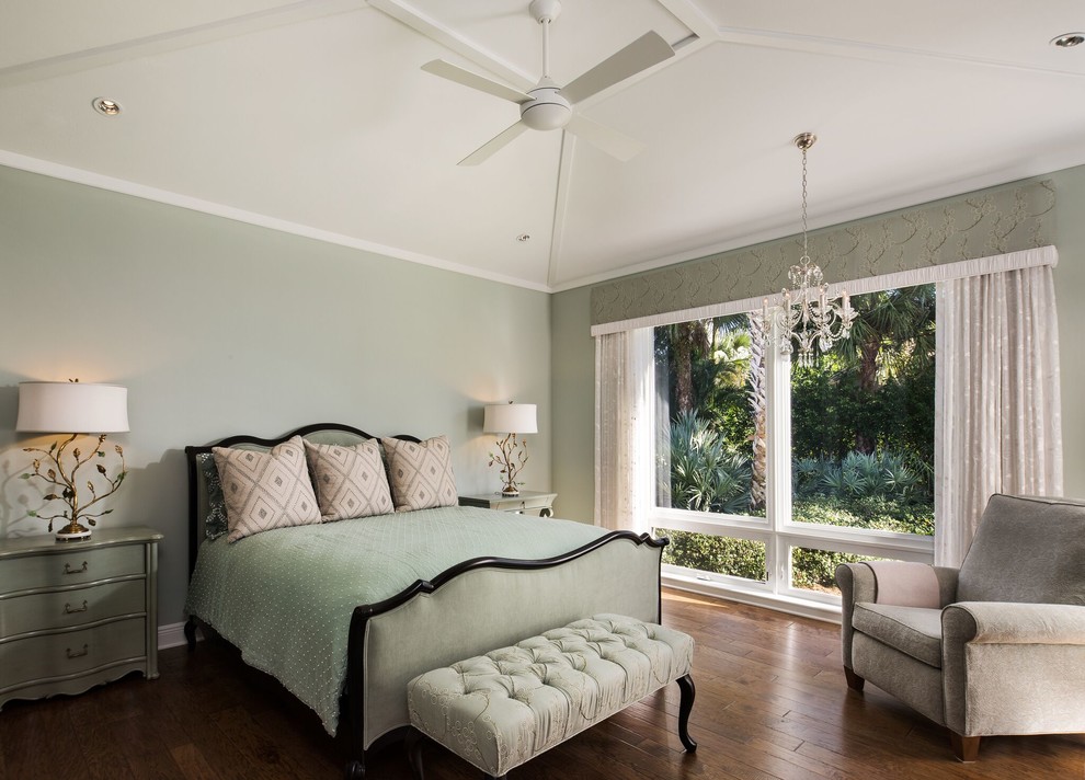 Mid-sized transitional master bedroom in Miami with green walls and medium hardwood floors.