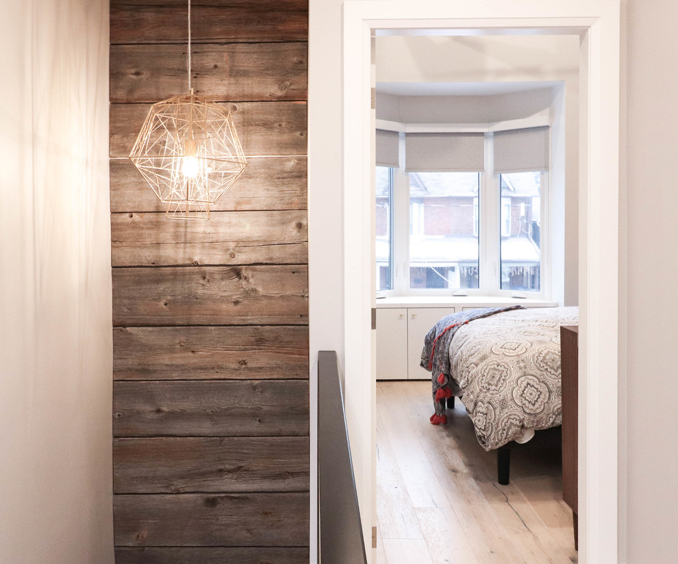 Small transitional straight metal railing staircase photo in Toronto